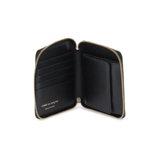 Comme Des Garcons Wallet lenticular-effect zip-around wallet Small Leather Goods Comme Des Garcons Wallet