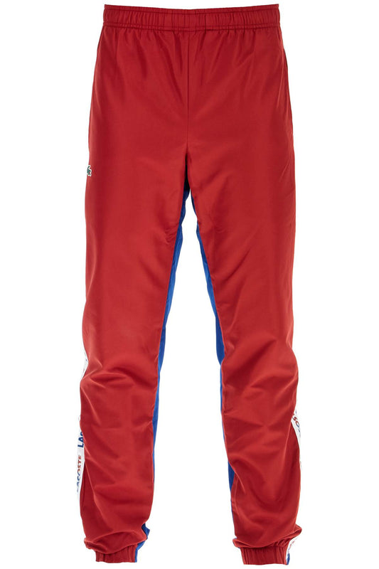 Lacoste with logo and color block design Trousers Lacoste