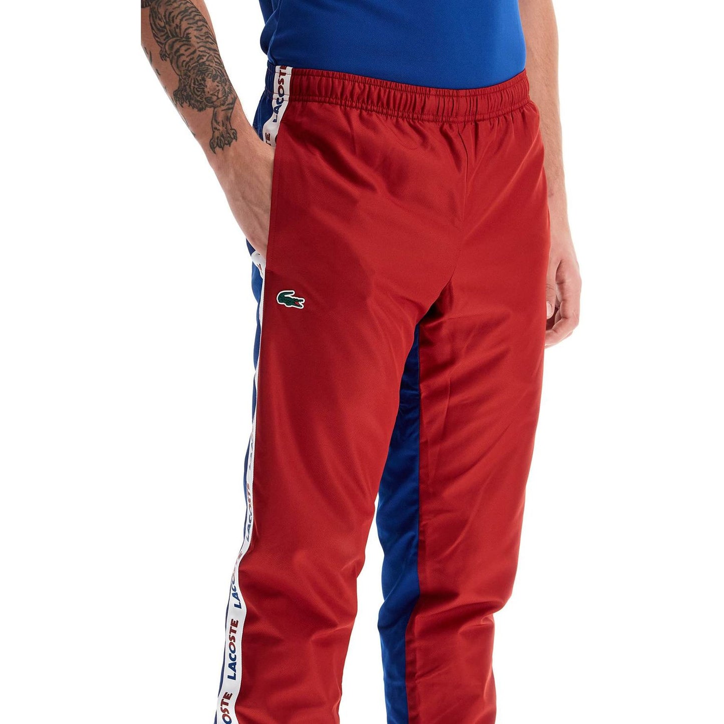 Lacoste with logo and color block design Trousers Lacoste